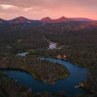 Admire the pink morning sky above Wollemi National Park