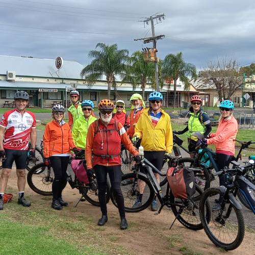 Happy group of cyclists on the Warrumbungles & Pilliga Supported Cycle tour