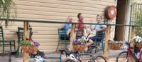 A happy group of cyclists enjoying the local cuisine. | Shawn Flannery