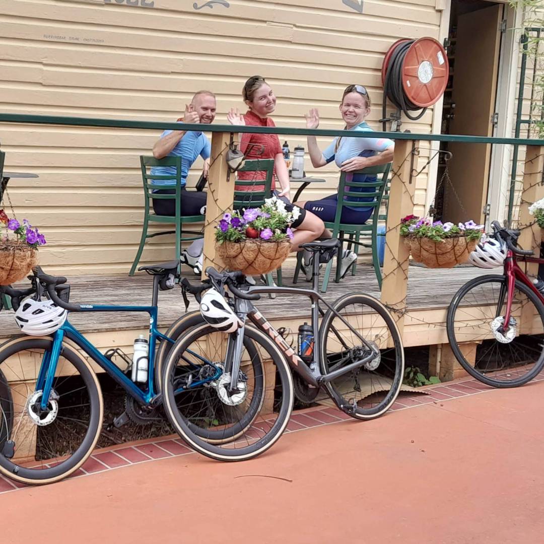 A happy group of cyclists enjoying the local cuisine. | Shawn Flannery