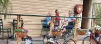 A happy group of cyclists enjoying the local cuisine. | Shawn Flannery