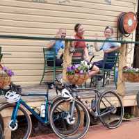 A happy group of cyclists enjoying the local cuisine. | Shawn Flannery