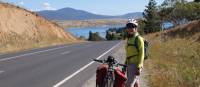 Cyclist on the Barry Way with view of Lake Jindabyne | Ross Baker