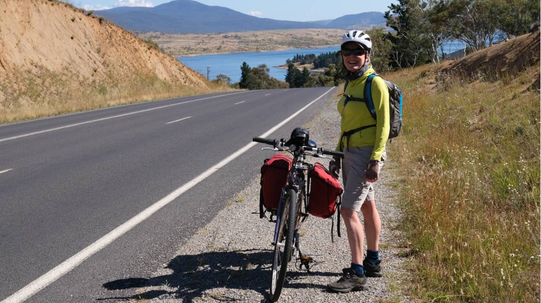 Cyclist on the Barry Way with view of Lake Jindabyne | <i>Ross Baker</i>