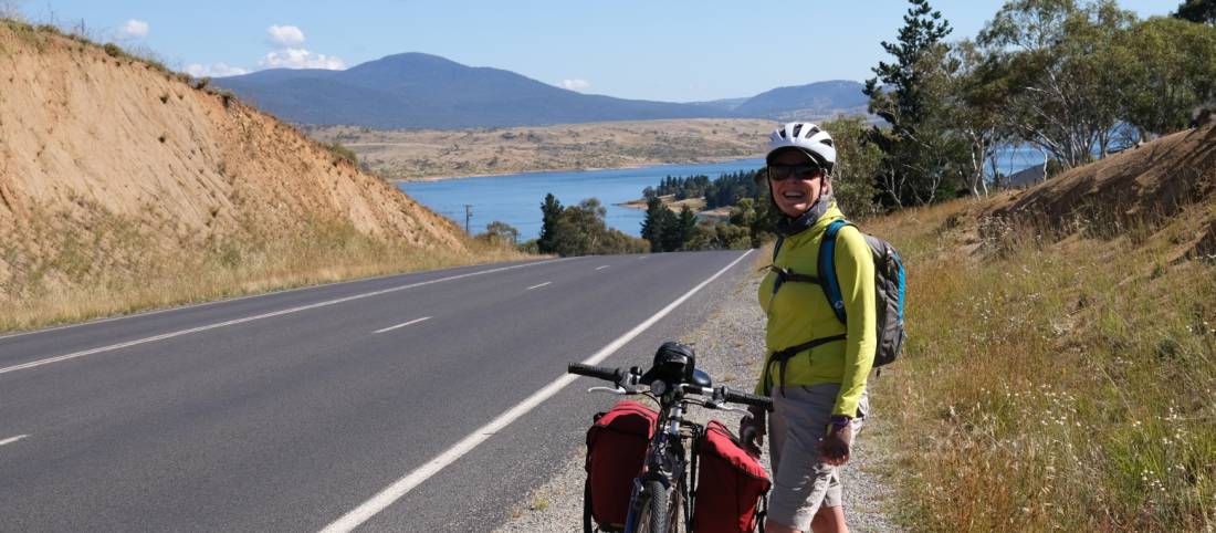 Cyclist on the Barry Way with view of Lake Jindabyne |  <i>Ross Baker</i>