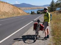 Cyclist on the Barry Way with view of Lake Jindabyne |  <i>Ross Baker</i>