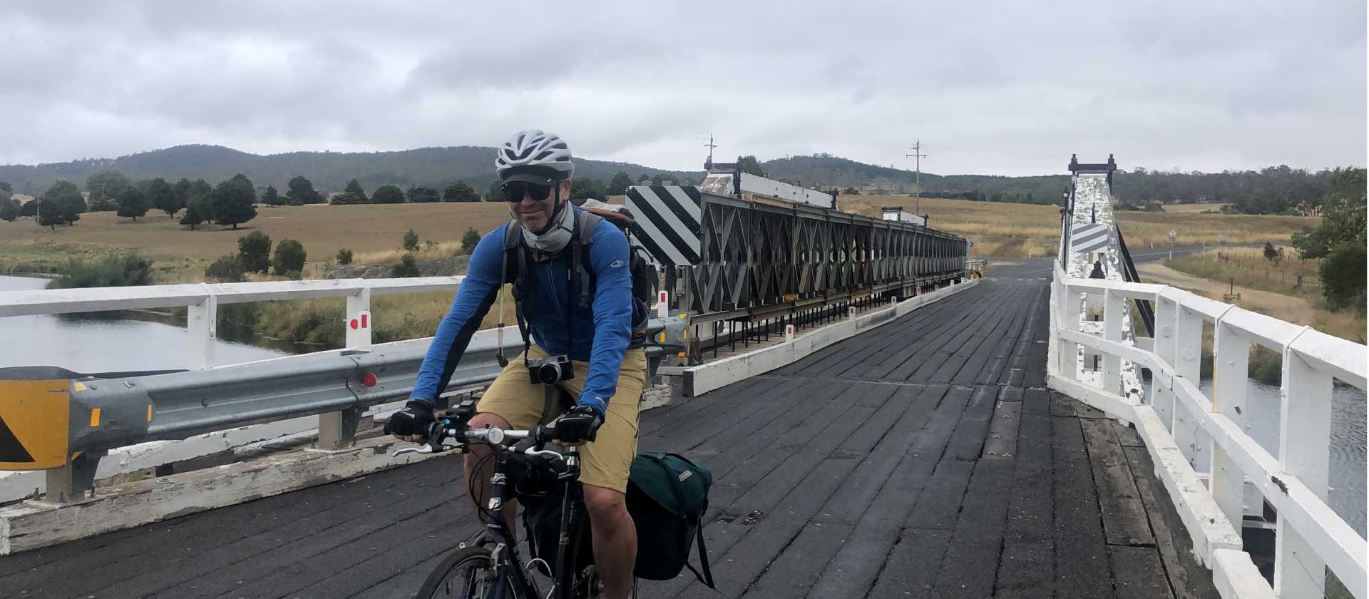 Cycling over bridge outside Cathcart | Kate Baker