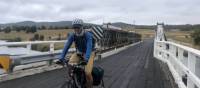 Cycling over bridge outside Cathcart | Kate Baker