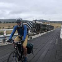 Cycling over bridge outside Cathcart | Kate Baker
