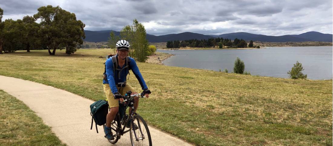 Cyclist alongside Lake Jindabyne | <i>Kate Baker</i>