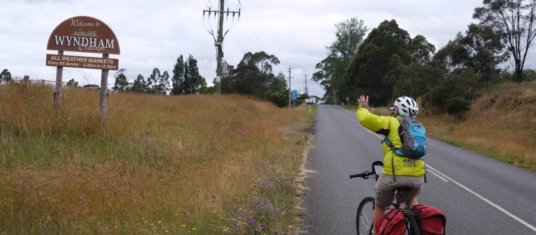 Cyclist approaching the country town of Wyndham | <i>Ross Baker</i>