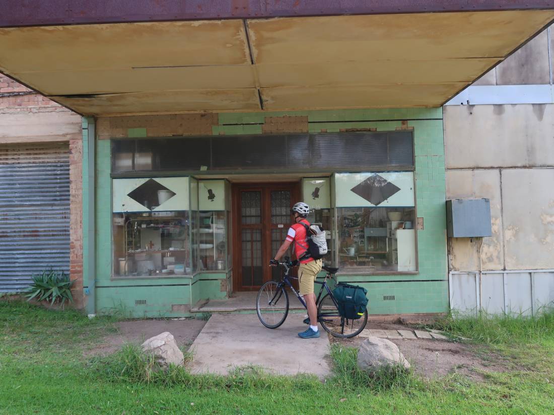 Cyclist at abandoned shop in Glen Davis in the Capertee Valley |  <i>Ross Baker</i>