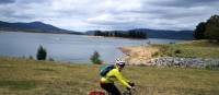 Cyclist on the cycle path alongside Lake Jindabyne | Ross Baker