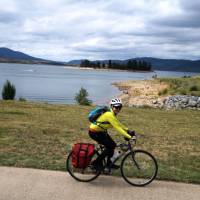 Cyclist on the cycle path alongside Lake Jindabyne | Ross Baker