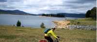 Cyclist on the cycle path alongside Lake Jindabyne | Ross Baker