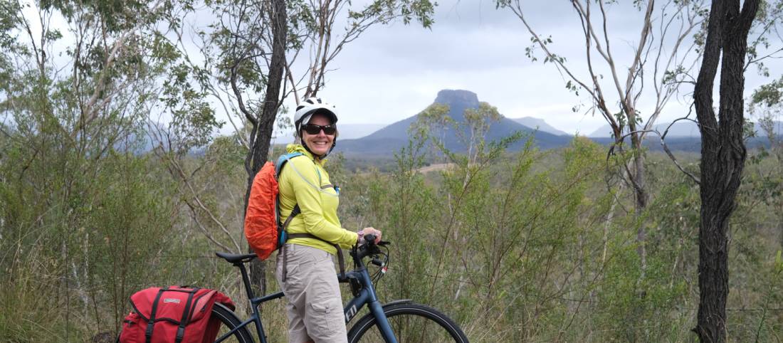 Cyclist viewing the impressive rock formations of the Capertee Valley |  <i>Ross Baker</i>