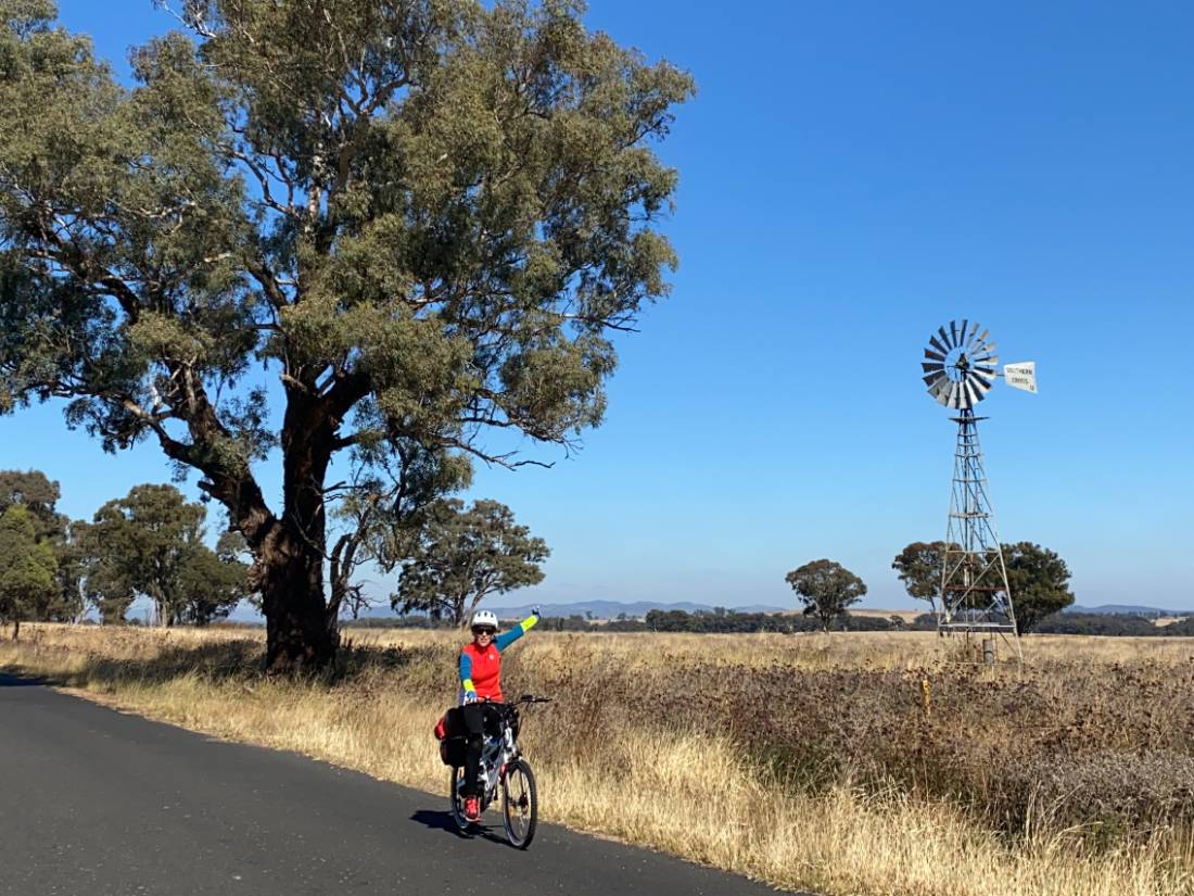 Cyclist with Windmill on route between Gulgong and Dunedoo |  <i>Michele Eckersley</i>