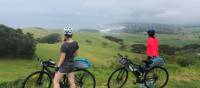 Cyclists soaking up the view of the coastline between Kiama and Gerroa | Kate Baker