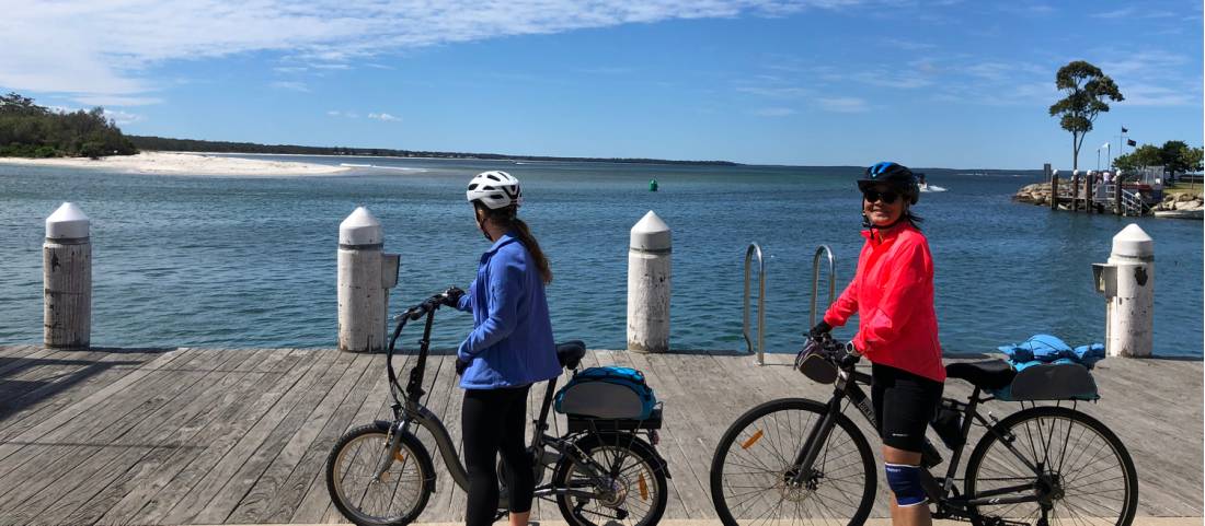Cyclists taking in the view in Huskisson on Jervis Bay |  <i>Kate Baker</i>
