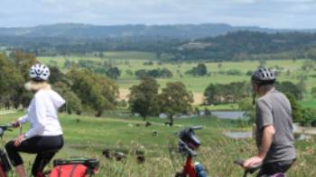 Cyclists taking in the view between Bowral and Robertson | Kate Baker