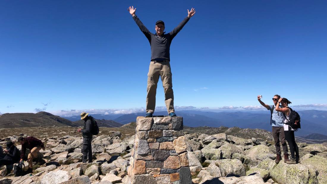 Hiker on top of Kosciuszko |  <i>Kate Baker</i>