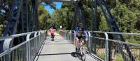 bridge crossing river on rail trail | Kate Baker