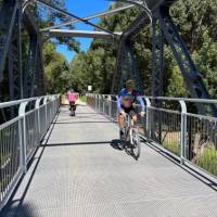 bridge crossing river on rail trail | Kate Baker