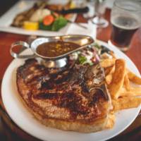 Enjoy a massive steak at the Hair of the Dog Inn | Tim Charody