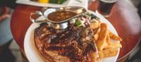 Enjoy a massive steak at the Hair of the Dog Inn | Tim Charody