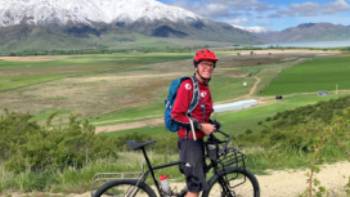 Benmore Lake,Sandra Appleby Riding over the Chain Hills to Sailors Cutting