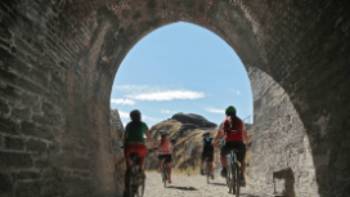 Otago Rail Trail Tunnel - TCO,James Jubb Cycling through the Historic railway tunnels