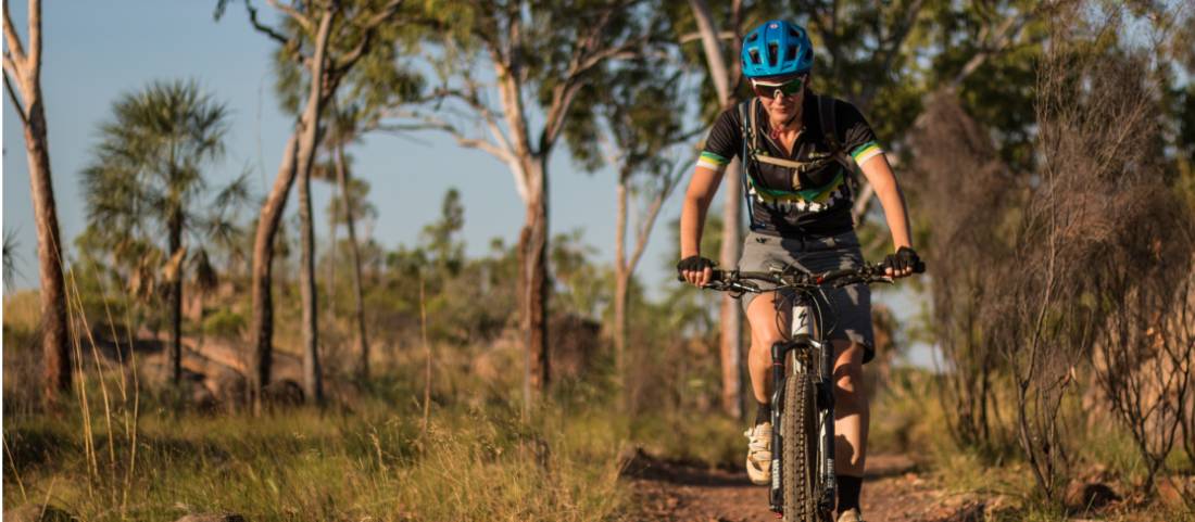 Cycling among the gum trees in the Northern Territory. |  <i>Travis Deane</i>