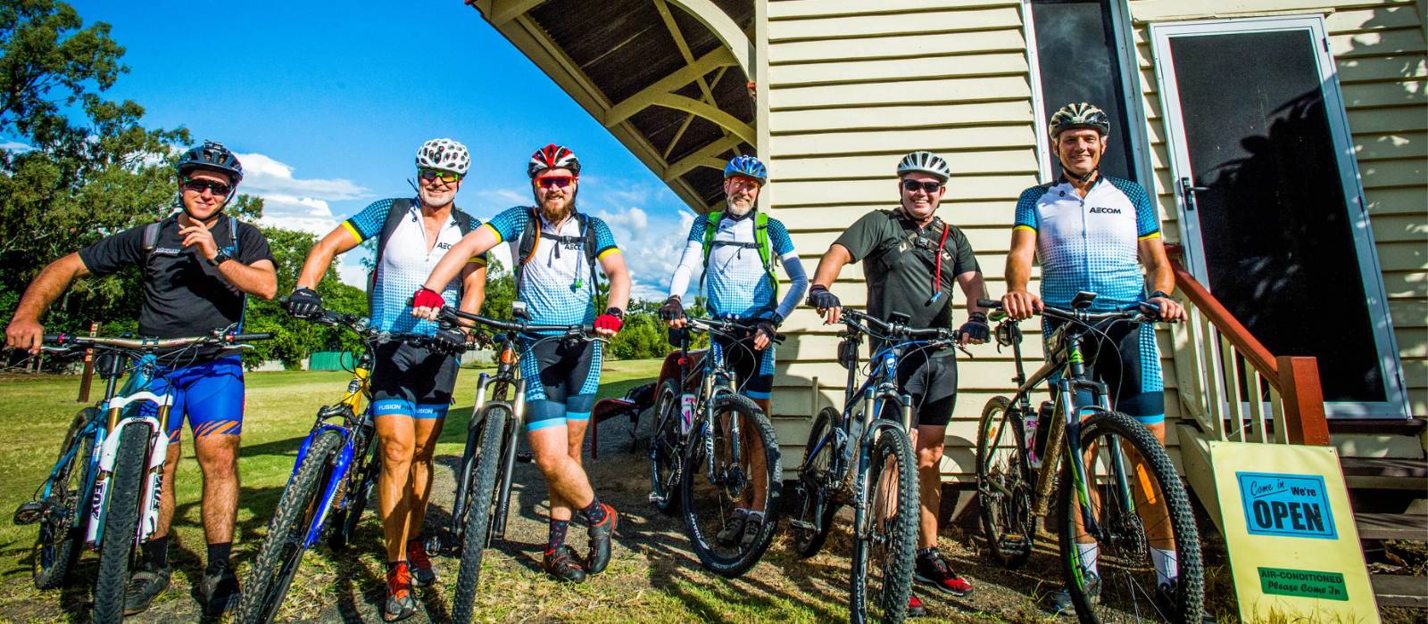 A group cycling the Brisbane Valley Rail Trail
