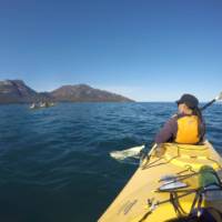 Kayaking on Coles Bay, with the Hazards in the distance | Brad Atwal