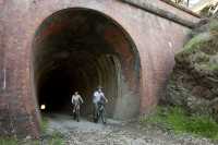 Cycling through the Cheviote Tunnel on the Great Victorian Rail Trail |  Robert Blackburn