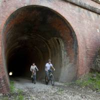 Cycling through the Cheviote Tunnel on the Great Victorian Rail Trail | Robert Blackburn