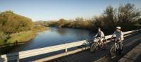 Cyclists crossing the Goulburn River | Robert Blackburn