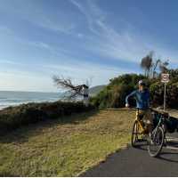 Cyclist on the Great Ocean Road | Kate Baker