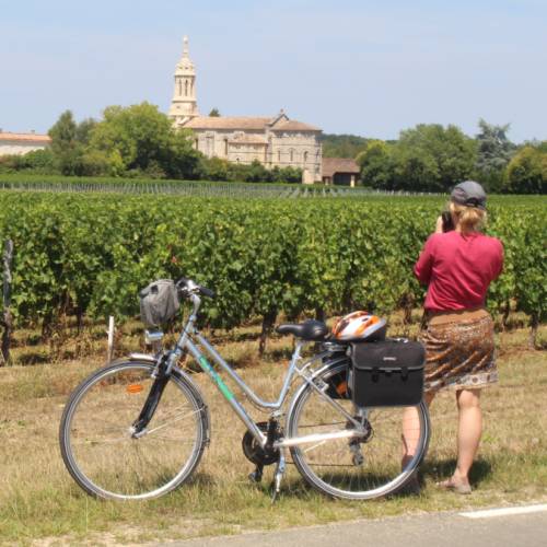 Cyclist stopping to take a photo in Bordeaux