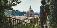 Pilgrim walking into St Peters in Rome at the end of the Via Francigena |  <i>Tim Charody</i>