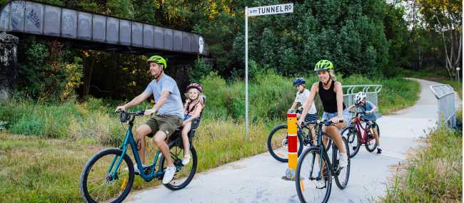 Family cycling the Northern Rivers Rail Trail