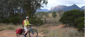 Cyclist at a viewpoint in the Capertee Valley | Ross Baker