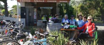 Enjoying coffee t the Rail Trail Cafe on the Murray to Mountains Rail Trail